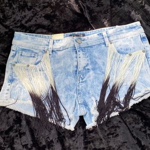 With tags.  Shyanne jean shorts, white/black fringe light washed.  Size 33